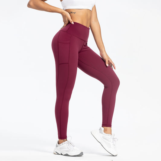 Pantalones de yoga deportivos de cintura alta con bolsillos y corte ajustado para mujer